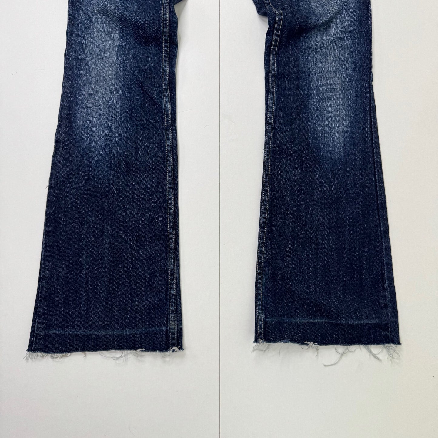 Y2K vintage low rise bootcut denim jeans dark blue wash stretchy faded