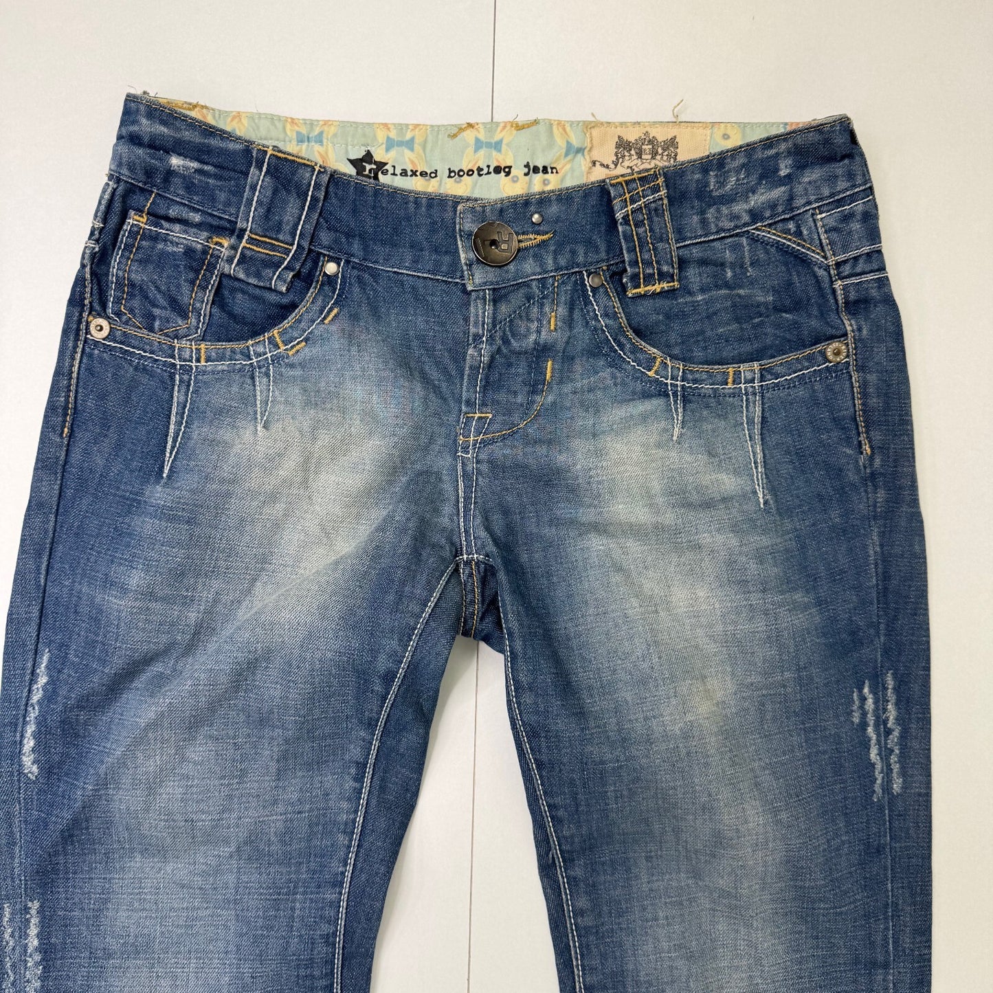 Y2K vintage low rise bootcut jeans faded denim distressed baggy mid blue