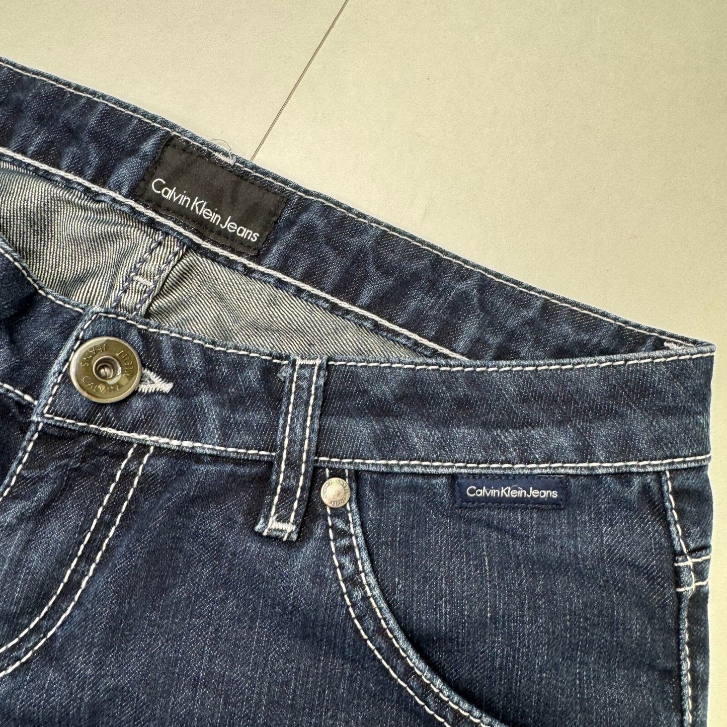 Y2K vintage Calvin Klein Jeans capri denim cropped dark blue wash stretchy zips