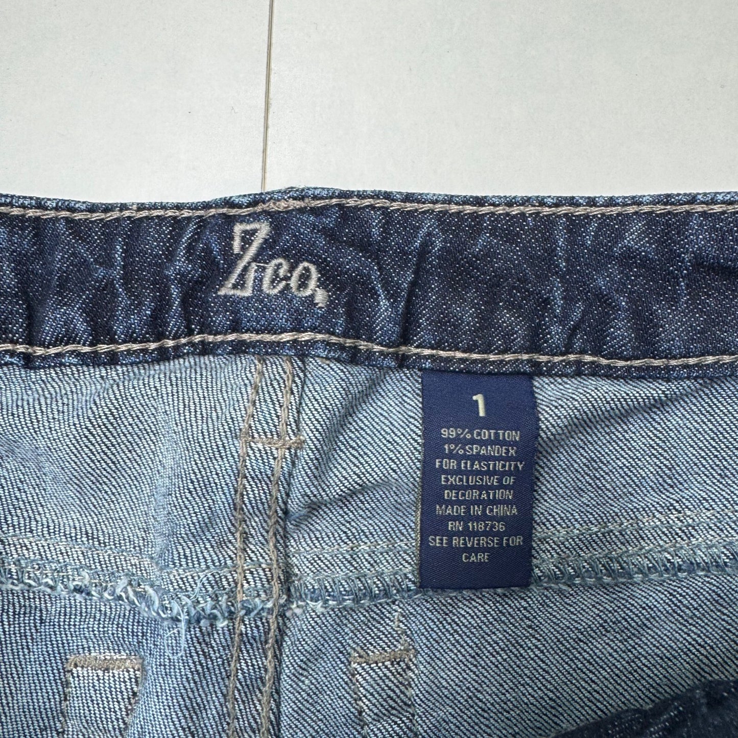 Y2K vintage low rise bootcut denim jeans dark blue wash stretchy faded