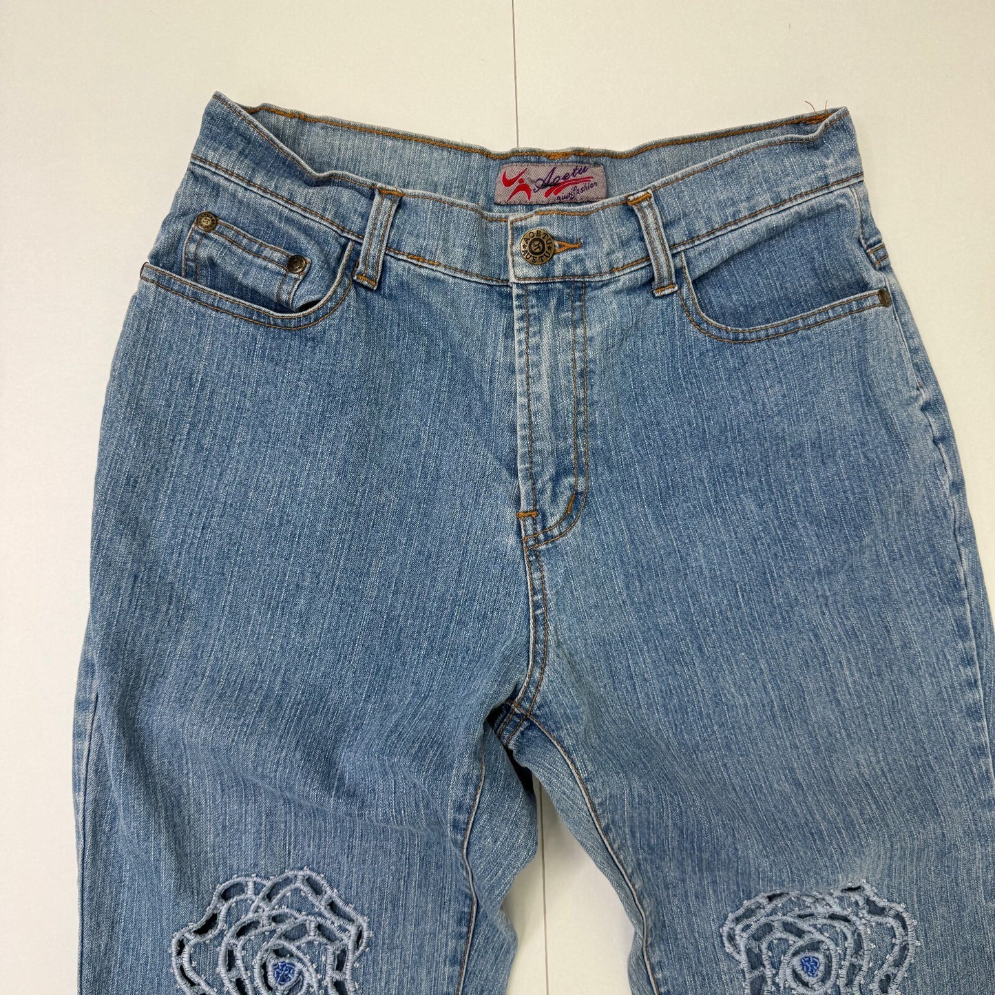 Y2K vintage bootcut denim jeans cut out beaded floral pattern light blue wash