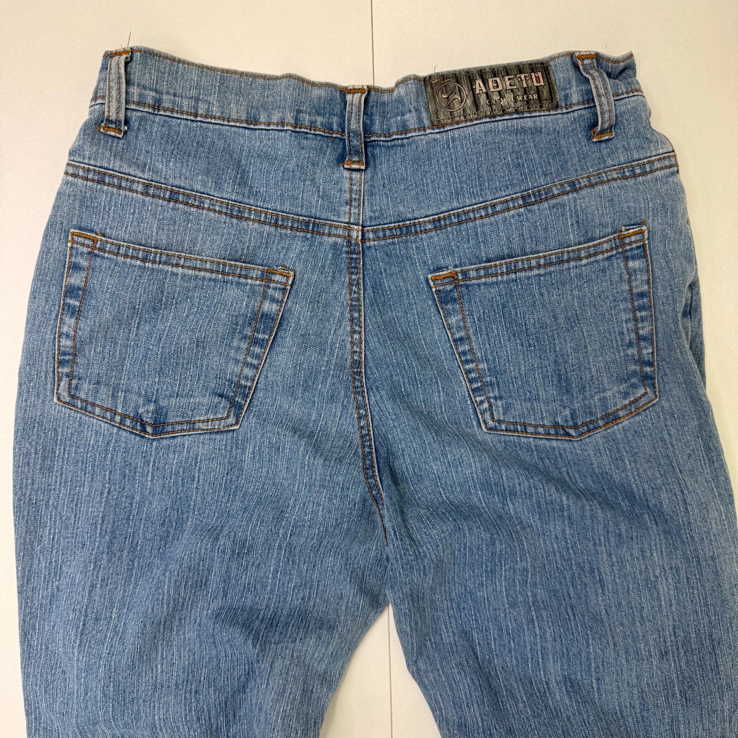 Y2K vintage bootcut denim jeans cut out beaded floral pattern light blue wash