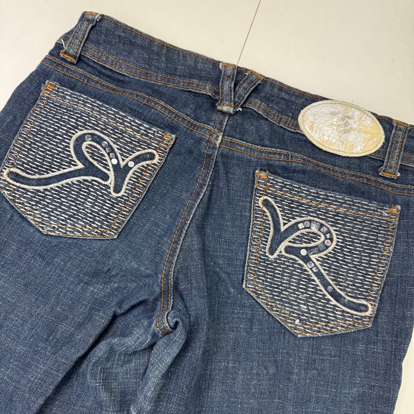 Y2K vintage Rocawear low rise bootcut denim jeans dark denim wash embroidered