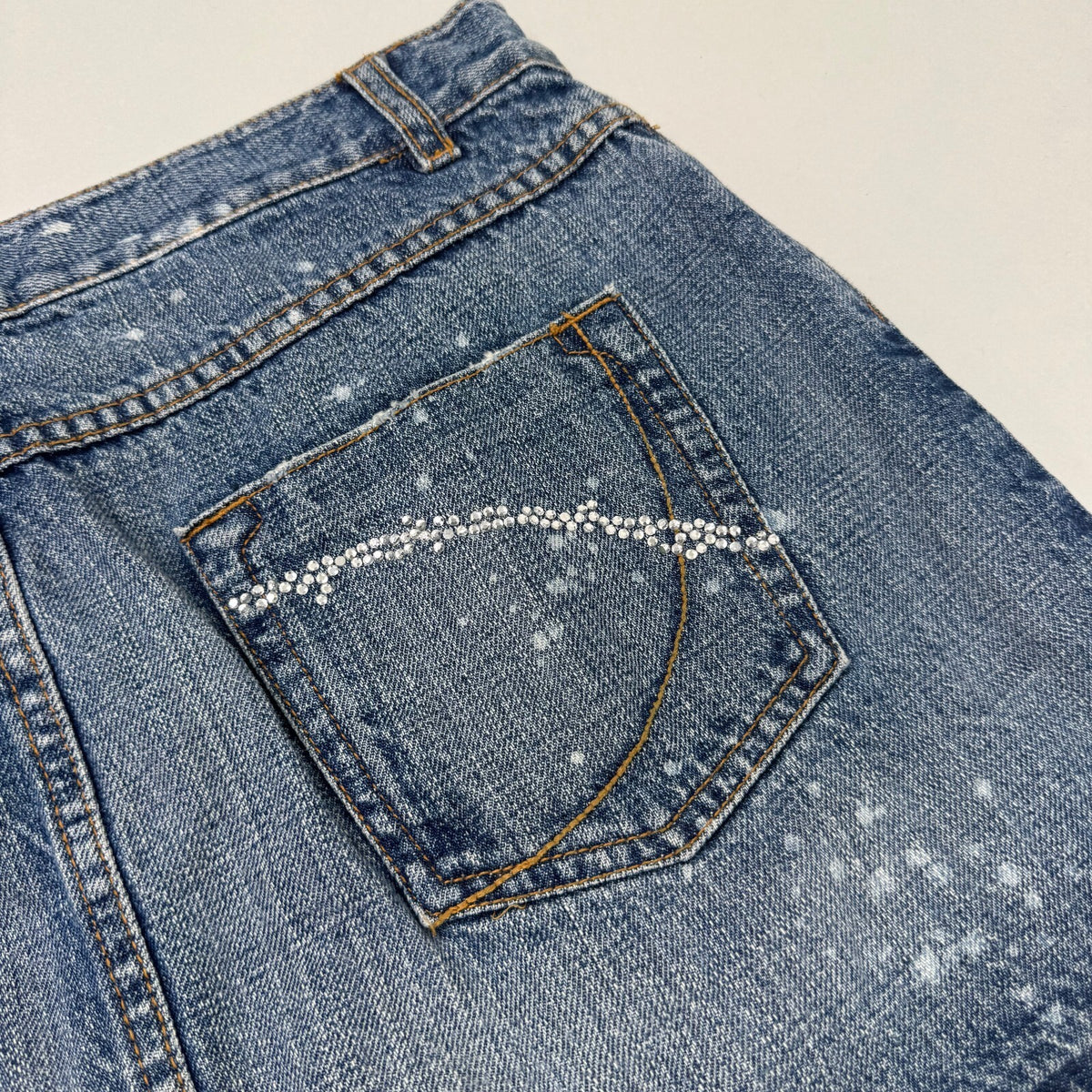 Y2K vintage mini skirt mid blue wash denim rhinestone distressed fraying hem