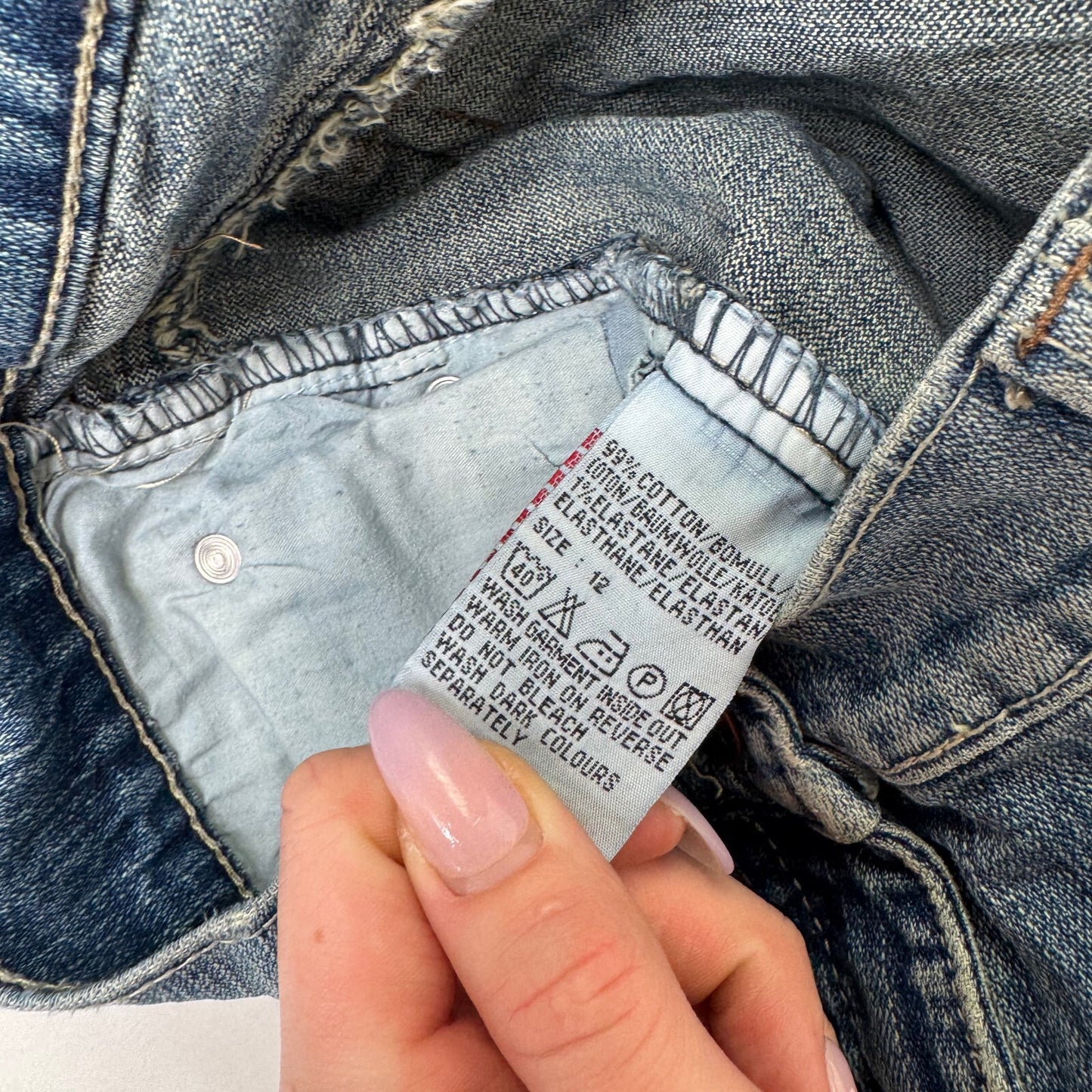 Y2K vintage bootcut denim jeans stretchy faded mid blue distressed