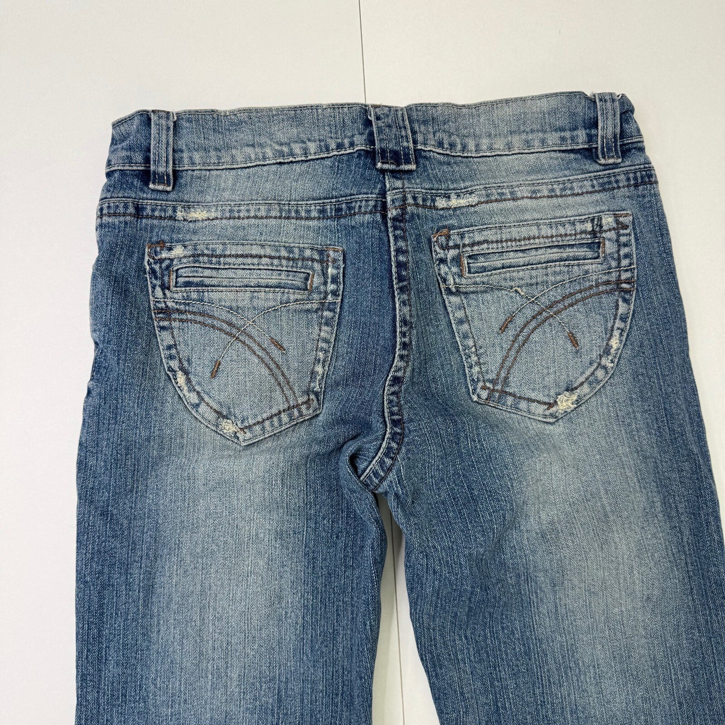 Y2K vintage bootcut denim jeans stretchy faded mid blue distressed