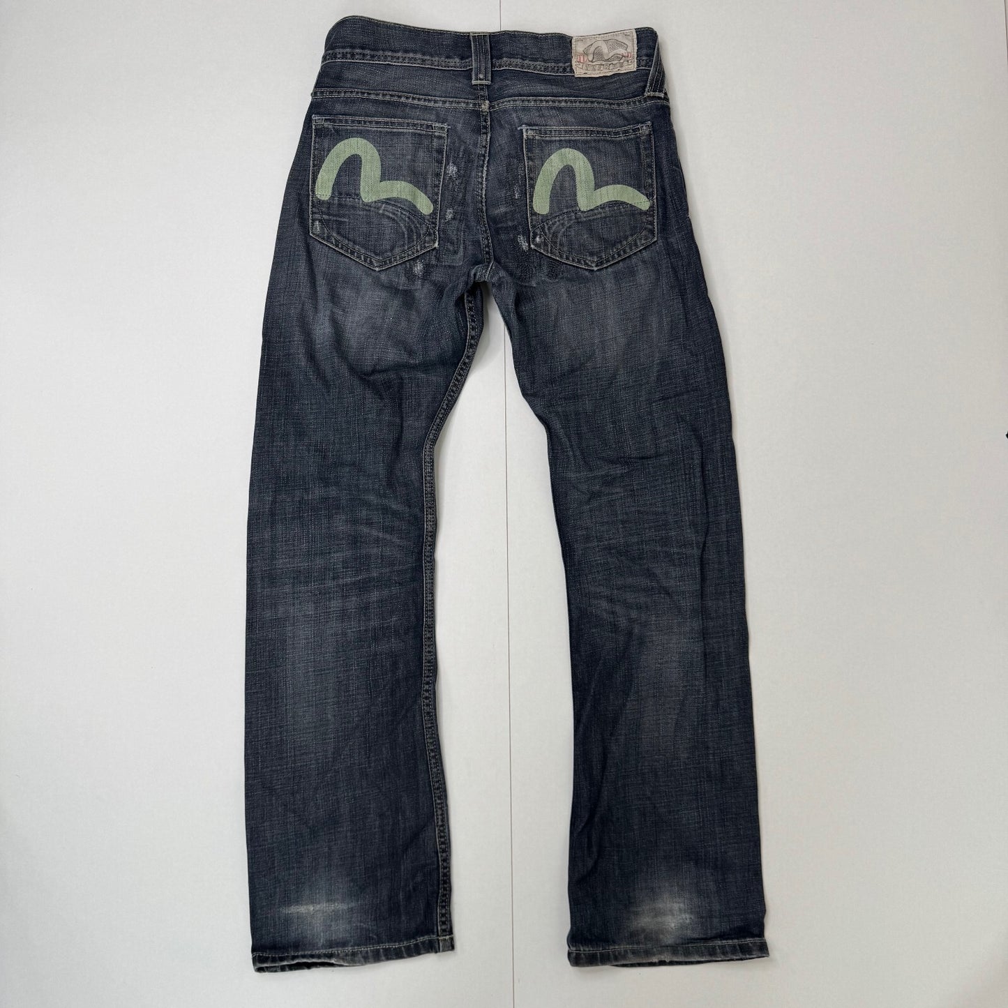 Y2K vintage Evisu x Puma bootcut jeans dark faded denim wash distressed