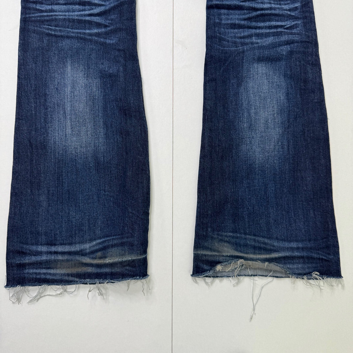 Y2K vintage super low rise bootcut denim jeans dark blue wash stretchy faded