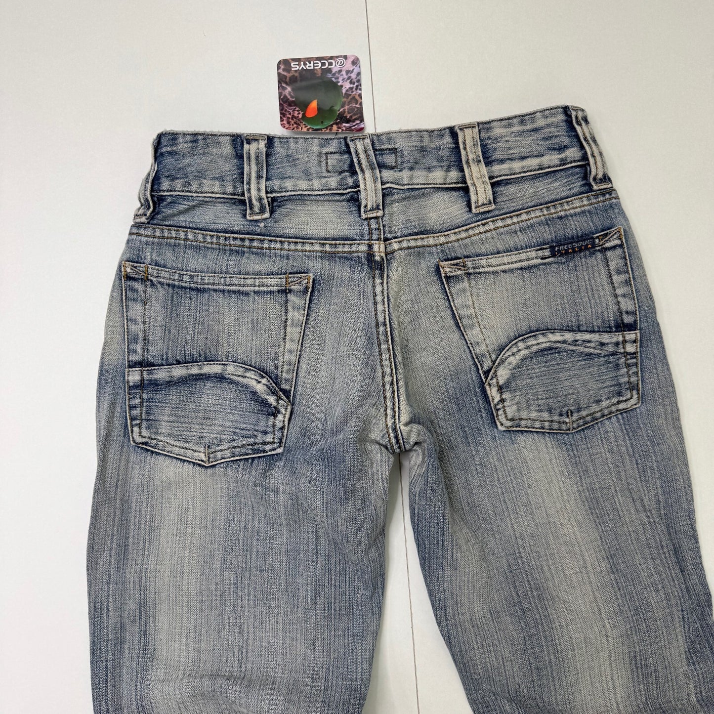 Y2K vintage low rise bootcut denim jeans faded distressed stripe wash