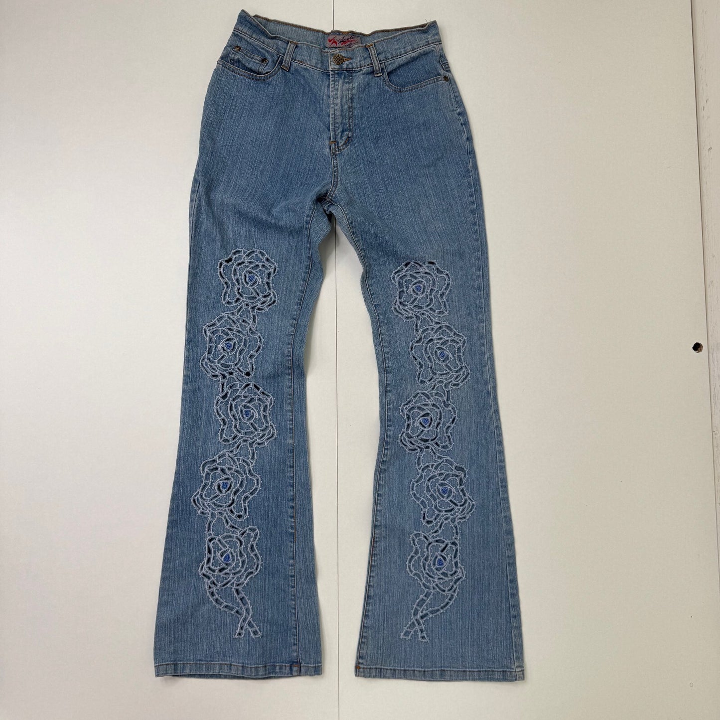 Y2K vintage bootcut denim jeans cut out beaded floral pattern light blue wash