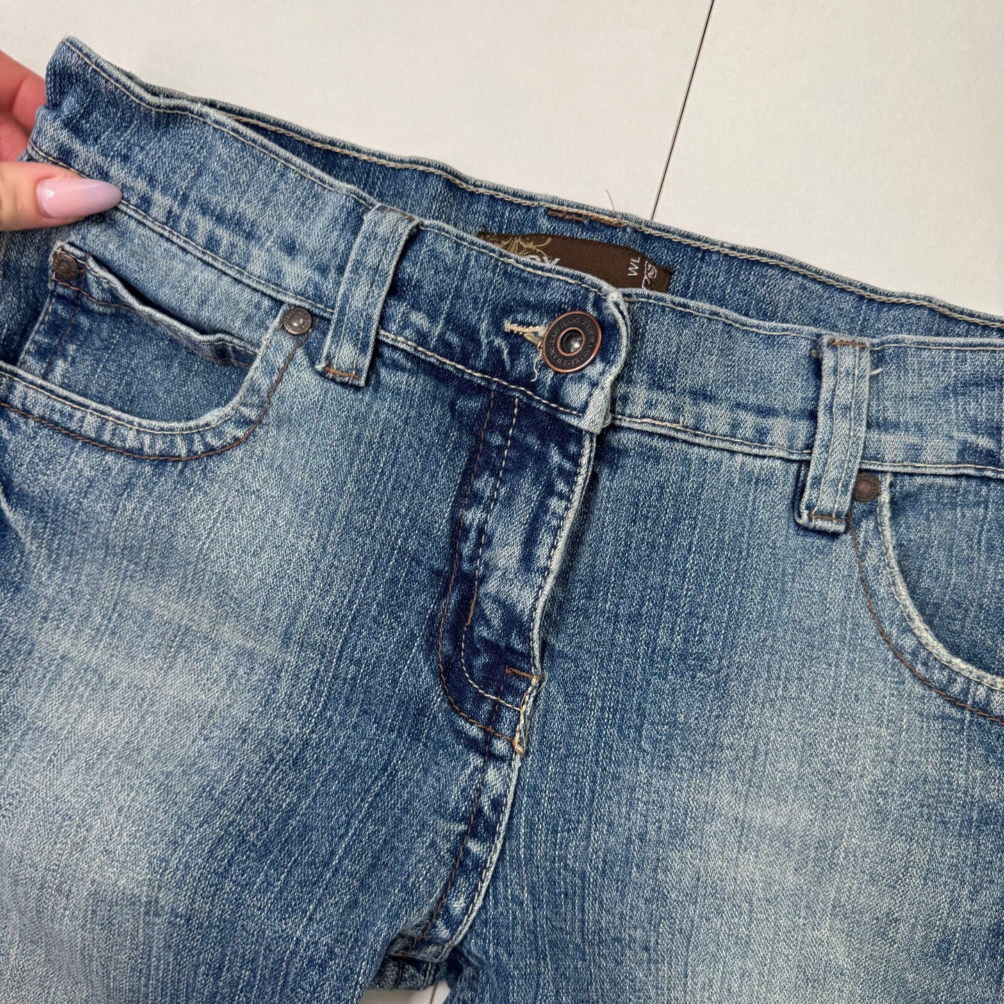 Y2K vintage bootcut denim jeans stretchy faded mid blue distressed