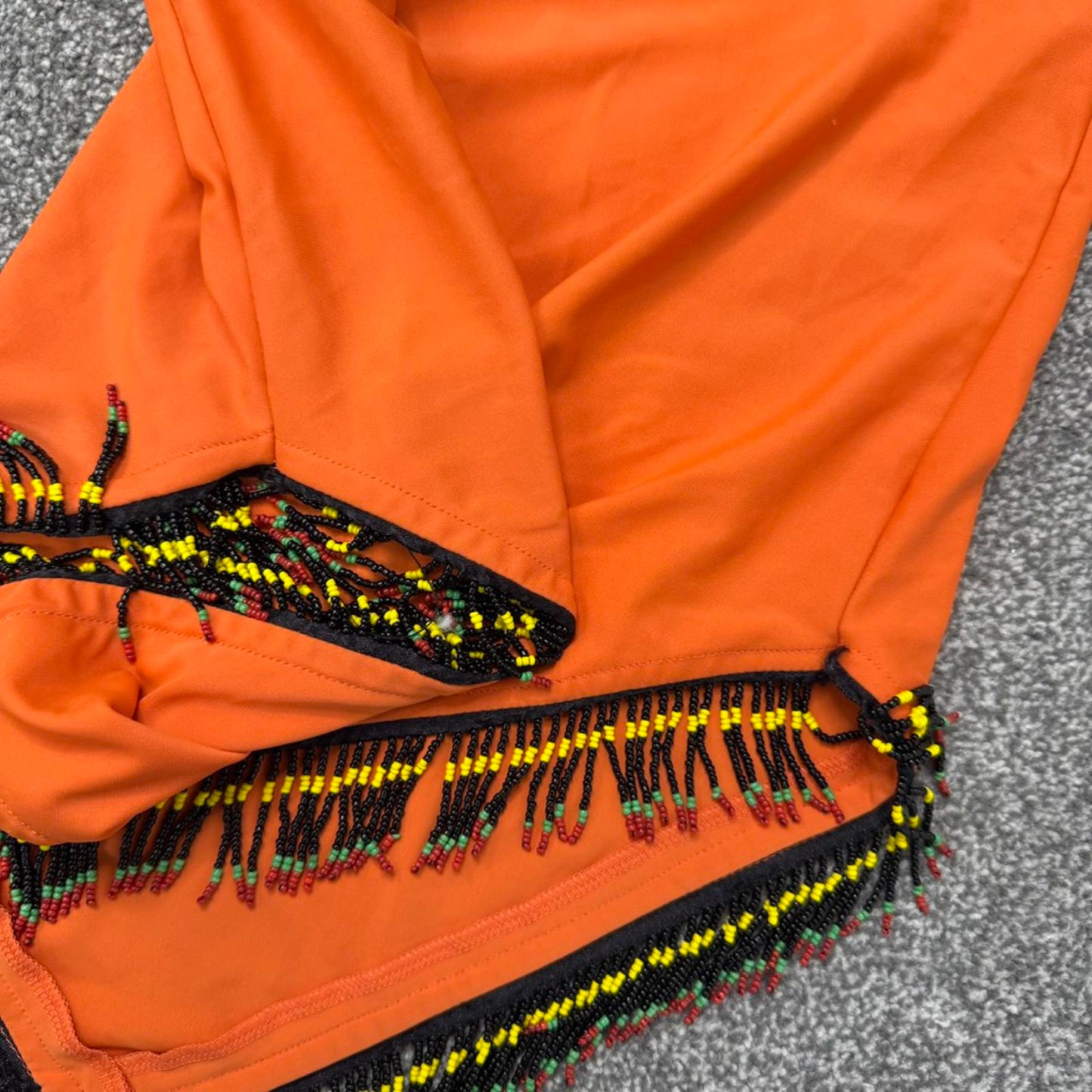 Y2K vintage slinky mini skirt beaded v shaped hem tassel fringe low/mid rise