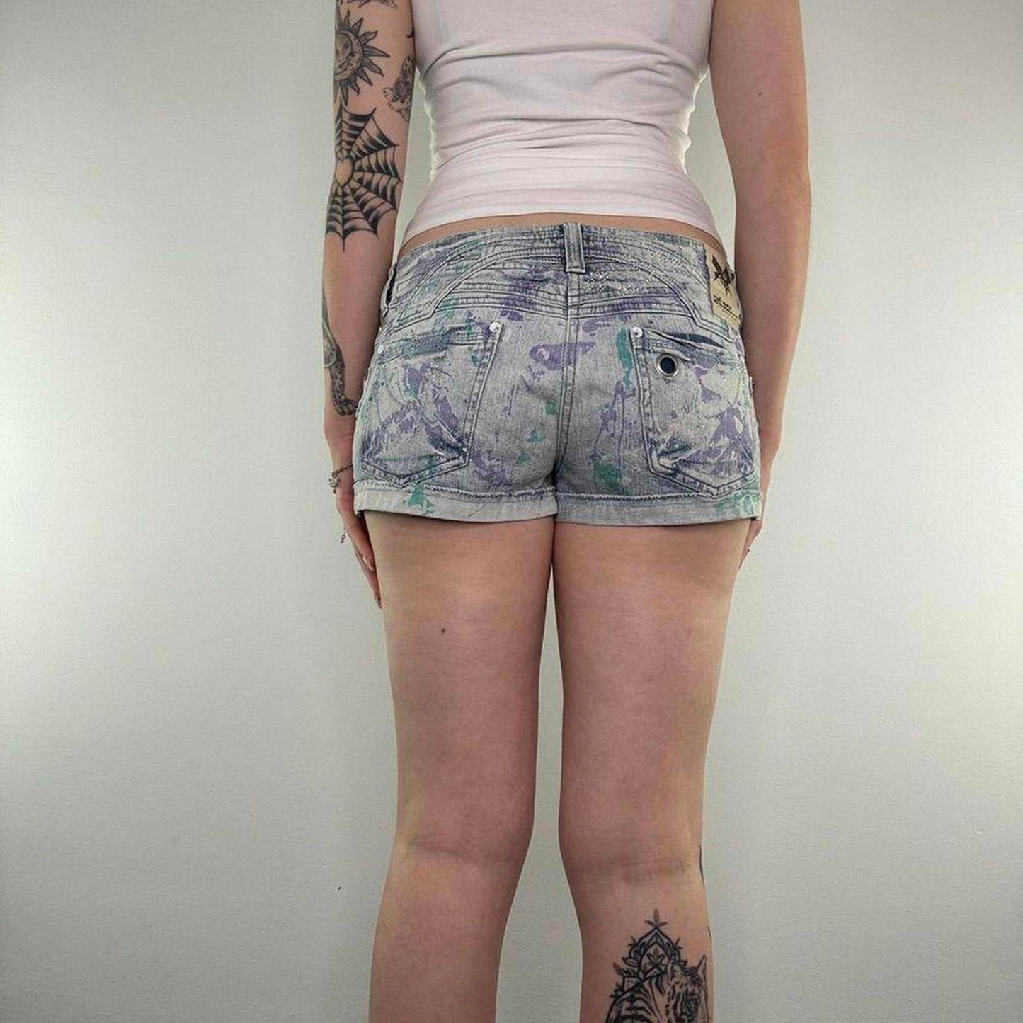Y2K vintage low rise mini denim shorts paint splatter rhinestone embellished