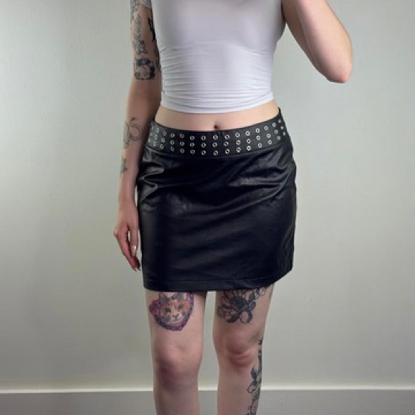 Y2K vintage faux leather studded mini skirt grommet eyelet mid rise alt emo goth