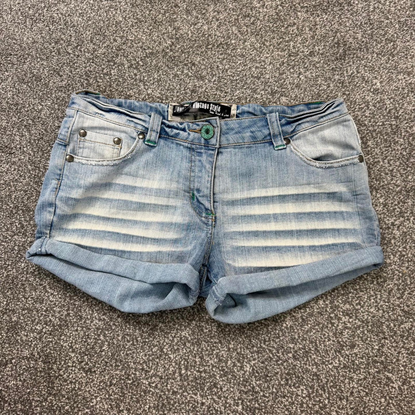 Y2K vintage low rise faded denim mini shorts stretchy turned up hem light blue