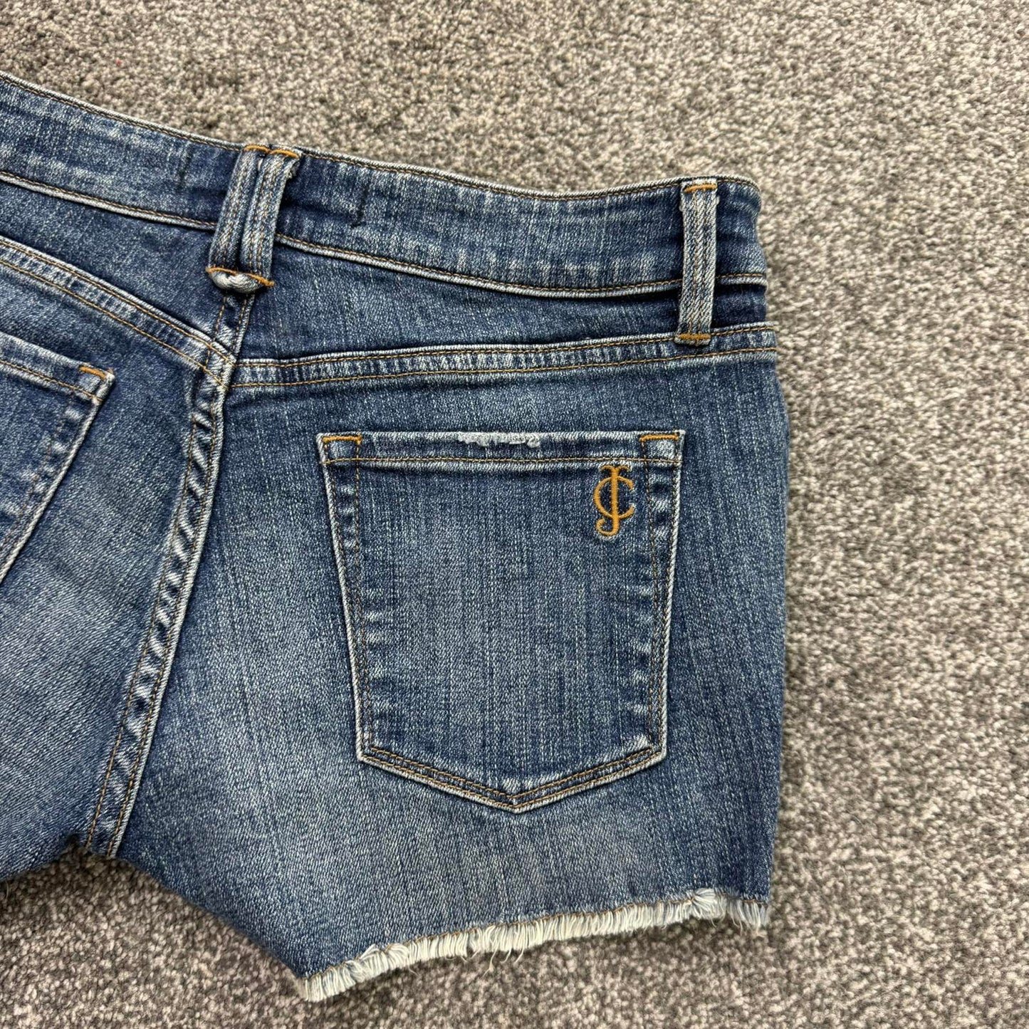 Y2K vintage Juicy Couture low rise denim mini shorts faded fraying hem