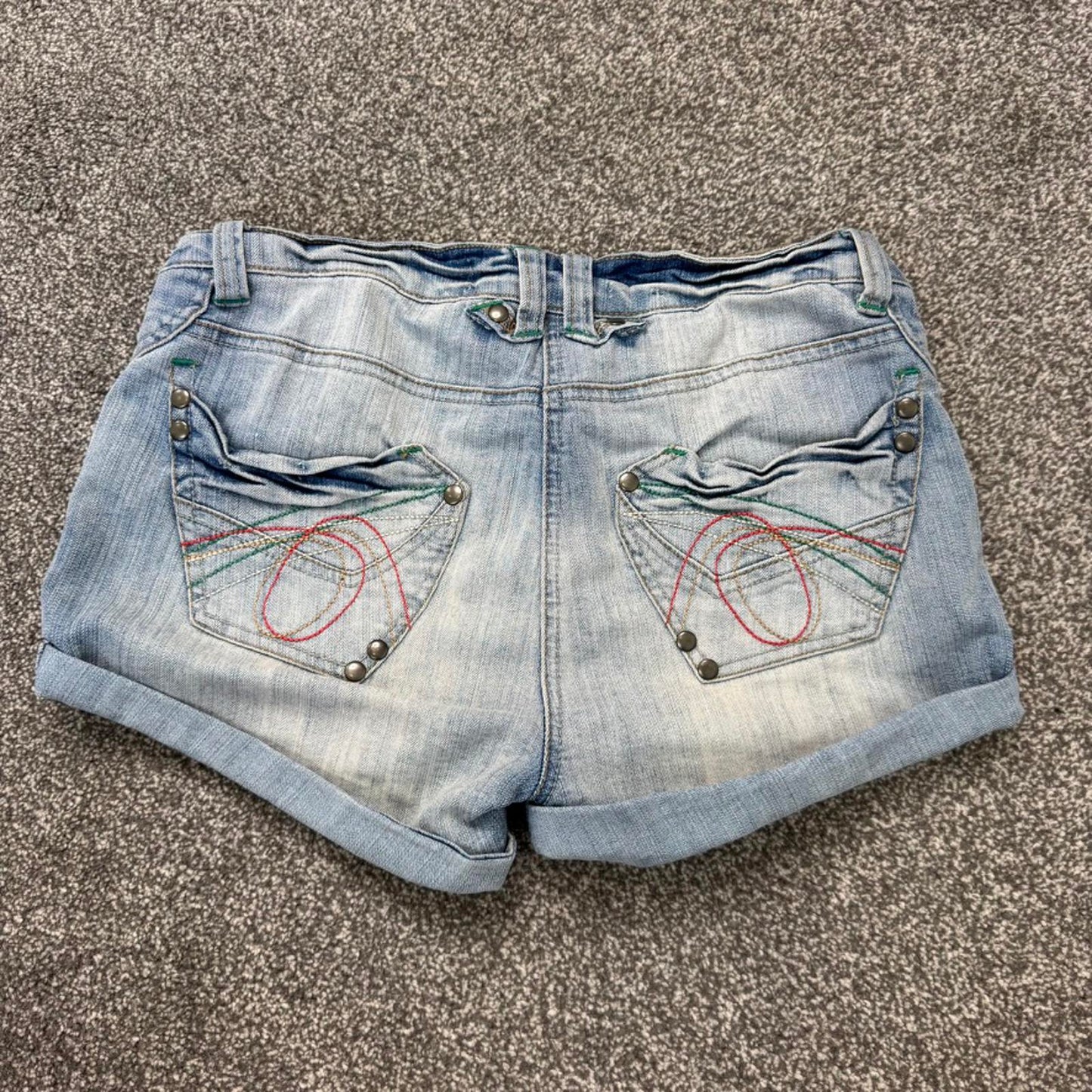 Y2K vintage low rise faded denim mini shorts stretchy turned up hem light blue