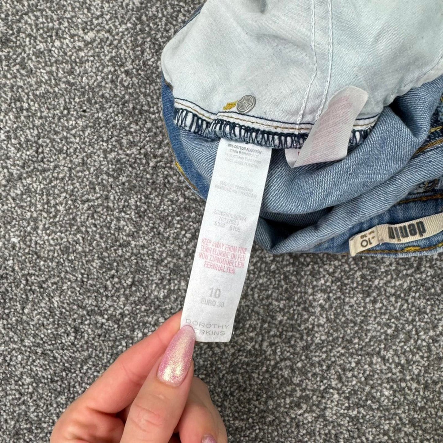 Y2K vintage low rise faded denim mini shorts embroidered aztec 2010s turned hem