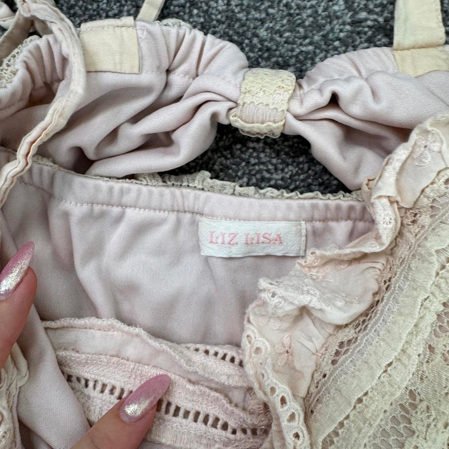 Japanese brand Liz Lisa coquette mini dress bows pink ruffle trim buttons lace