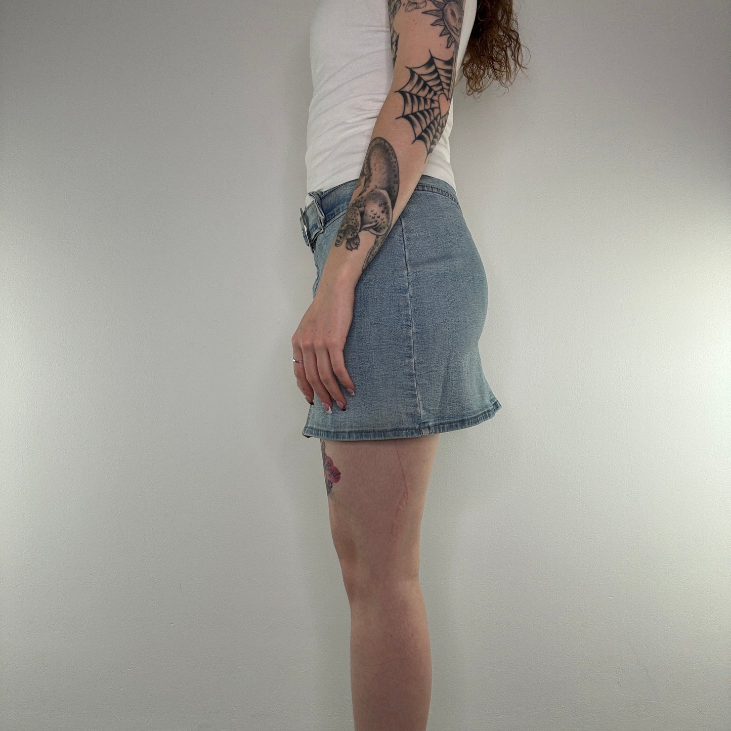 Y2K denim belted mini skirt