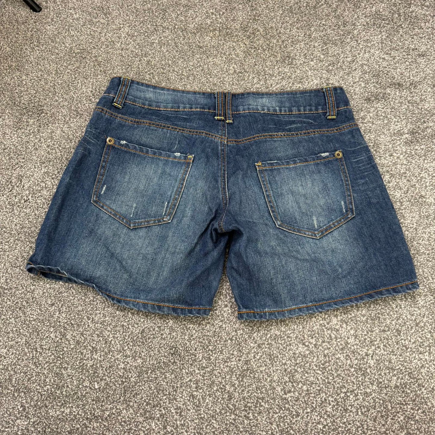Y2K vintage low rise denim shorts jorts faded blue wash distressed baggy
