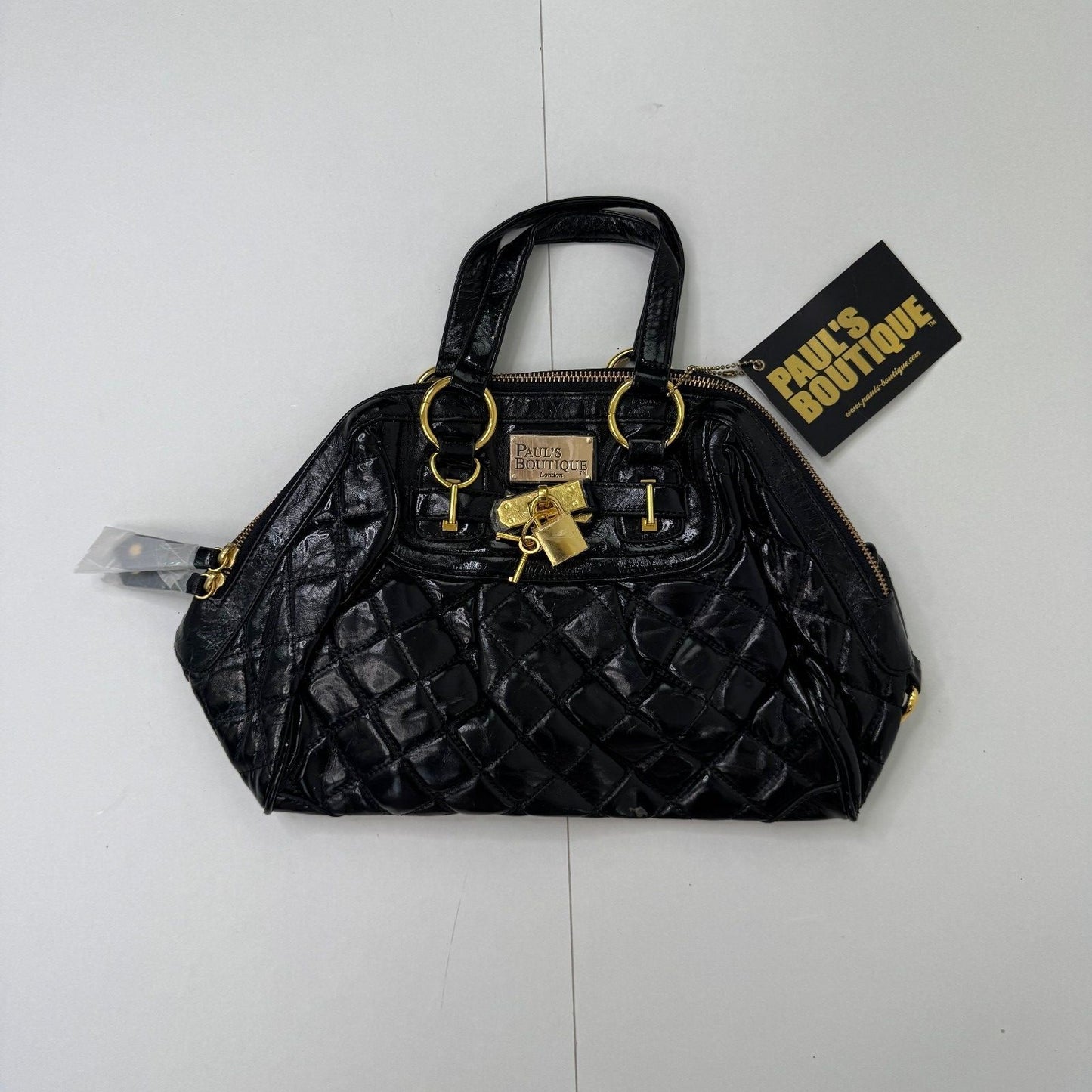 Y2K vintage Paul's Boutique handbag faux leather small quilted lock and key