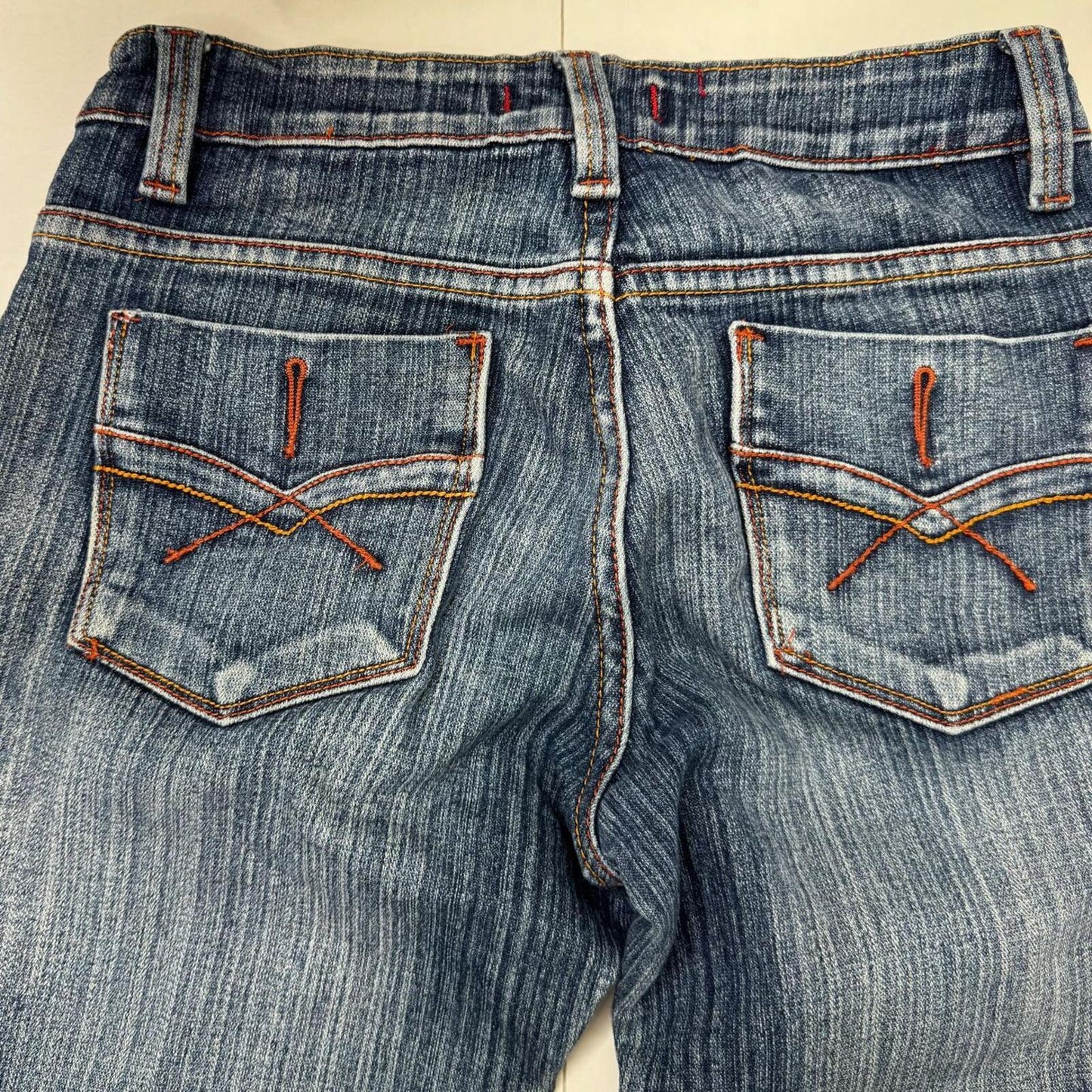 Y2K vintage bootcut denim jeans stretchy cargo pockets contrast stitch faded mid